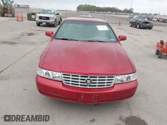 2001 Cadillac Seville z VIN 1G8KS54Y91U227846, wystawiony jako IAAI lot #42134095 z przebiegiem 216 766 mil mil oraz . Historia ofert i sprzedaży dostępna na DreamBid. Obrazek 6.
