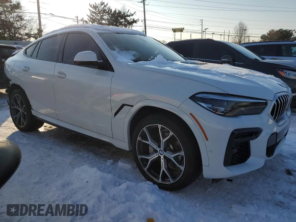 2022 BMW X6 xDrive40i with VIN 5UXCY6C08N9K10724, listed as a Copart auction lot 88091075 with 30,825 mi miles and Salvage Title. Bid and sale history available at carsss.com. Image 4.