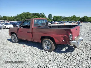 1991 Nissan Frontier XE with VIN 1N6SD11S2MC412375, listed as a Copart auction lot 61015515 with 201,629 mi miles and Salvage title. Bid and sale history available at DreamBid. Image 2.