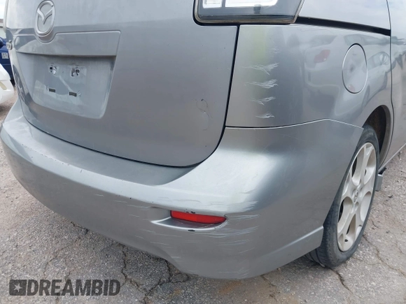 2010 Mazda 5 Sport with VIN JM1CR2WL8A0387155, listed as a IAAI auction lot 42773874 with 146,418 mi miles and . Bid and sale history available at DreamBid. Image 12.