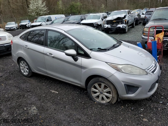 2011 Ford Fiesta SE with VIN 3FADP4BJ2BM172692, listed as a Copart auction lot 51764535 with 138,910 mi miles and Salvage Title. Bid and sale history available at carsss.com. Image 4.