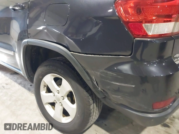 2013 Jeep Grand Cherokee Laredo with VIN 1C4RJFAG9DC583269, listed as a IAAI auction lot 41241085 with 147,995 mi miles. Bid and sale history available at carsss.com. Image 6.