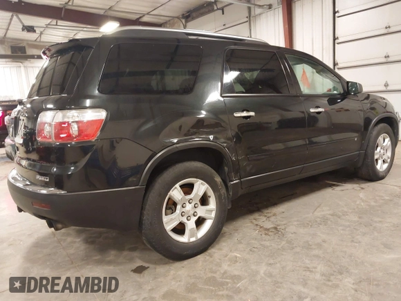 2009 GMC Acadia SLE1 with VIN 1GKEV13DX9J190901, listed as a IAAI auction lot 41932045 with 205,883 mi miles and . Bid and sale history available at carsss.com. Image 4.