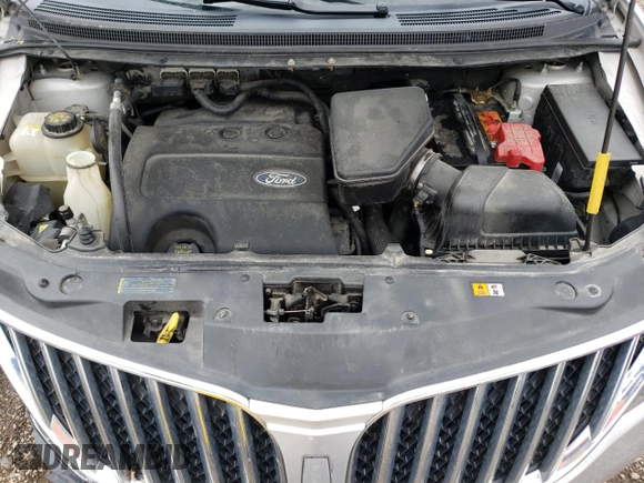 2011 Lincoln MKX z VIN 2LMDJ8JK2BBJ32076, wystawiony jako Copart lot #53683345 z przebiegiem 131 501 mil mil oraz Szkoda całkowita • Salvage title. Historia ofert i sprzedaży dostępna na DreamBid. Obrazek 12.
