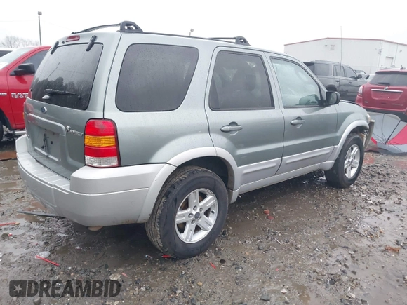 2005 Ford Escape Hybrid with VIN 1FMCU95H55KE10725, listed as a IAAI auction lot 41331983 with 1 mi miles. Bid and sale history available at carsss.com. Image 4.