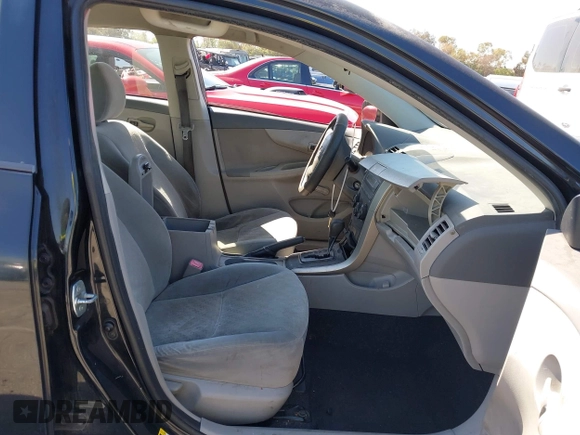 2009 Toyota Corolla with VIN JTDBL40E199094885, listed as a IAAI auction lot 41840789 with 106,498 mi miles. Bid and sale history available at carsss.com. Image 5.