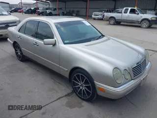 1999 Mercedes-Benz E-Class with VIN WDBJF65H9XA799820, listed as a IAAI auction lot 41959156 with 150,133 mi miles. Bid and sale history available at carsss.com. Image 1.