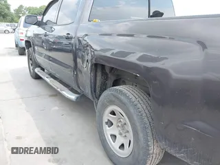 2015 Chevrolet Silverado 1500 LT with VIN 3GCPCREC7FG411610, listed as a IAAI auction lot 41975360 with 243,335 mi miles and . Bid and sale history available at DreamBid. Image 6.