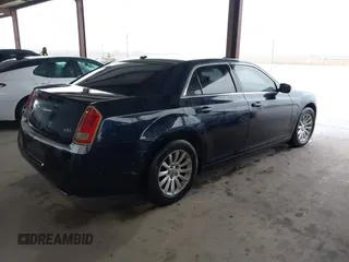 2011 Chrysler 300 with VIN 2C3CA4CGXBH523474, listed as a IAAI auction lot 41673690 with 187,389 mi miles. Bid and sale history available at carsss.com. Image 4.