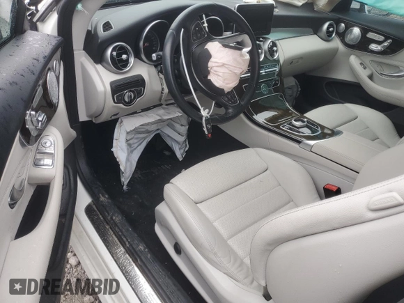 2017 Mercedes-Benz C 300 with VIN WDDWJ4JB4HF434869, listed as a Copart auction lot 61208785 with 64,582 mi miles and Salvage title. Bid and sale history available at DreamBid. Image 8.