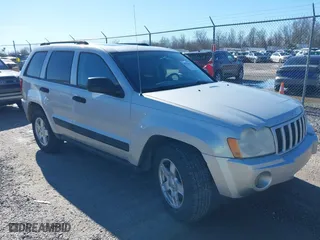 2005 Jeep Grand Cherokee Laredo with VIN 1J4HR48N65C537469, listed as a IAAI auction lot 41676555 with 226,084 mi miles. Bid and sale history available at carsss.com. Image 1.