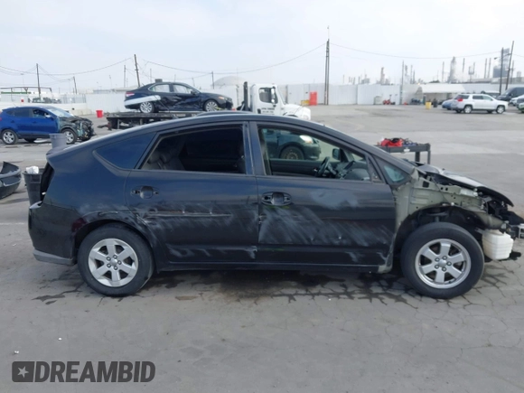 2007 Toyota Prius with VIN JTDKB20U977660315, listed as a IAAI auction lot 42097560 with 158,187 mi miles. Bid and sale history available at carsss.com. Image 14.