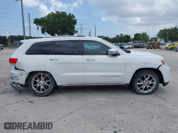 2014 Jeep Grand Cherokee Summit z VIN 1C4RJEJG1EC357948, wystawiony jako IAAI lot #42498652 z przebiegiem 213 715 mil mil oraz . Historia ofert i sprzedaży dostępna na DreamBid. Obrazek 13.