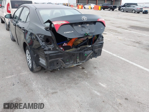 2019 Toyota Corolla L with VIN 5YFBURHE5KP945925, listed as a IAAI auction lot 41493079 with 96,849 mi miles and . Bid and sale history available at carsss.com. Image 6.