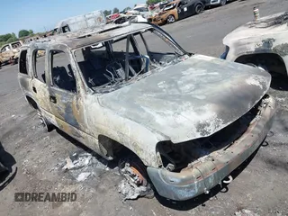 2001 GMC Yukon SLT z VIN 1GKEC13T01J194280, wystawiony jako IAAI lot #42495002 z przebiegiem Nie podano mil oraz . Historia ofert i sprzedaży dostępna na DreamBid. Obrazek 1.