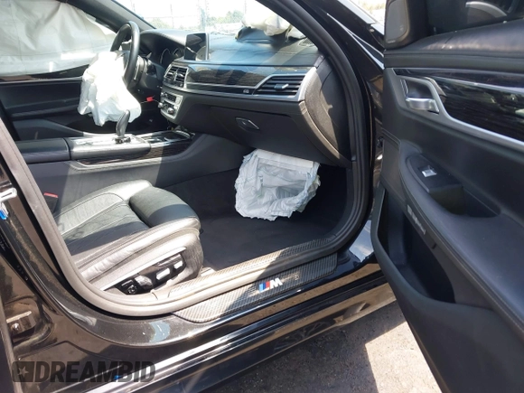 2017 BMW 7 Series 750i with VIN WBA7F0C37HGM22205, listed as a IAAI auction lot 40033800 with 70,581 mi miles. Bid and sale history available at carsss.com. Image 5.