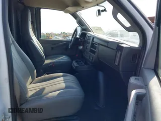 2024 Chevrolet Express Cargo with VIN 1GCWGAFP5R1282188, listed as a IAAI auction lot 42706483 with 10,116 mi miles and . Bid and sale history available at DreamBid. Image 5.