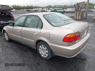 2000 Honda Civic EX z VIN 1HGEJ8645YL011681, wystawiony jako IAAI lot #42325903 z przebiegiem 149 418 mil mil oraz . Historia ofert i sprzedaży dostępna na DreamBid. Obrazek 3.