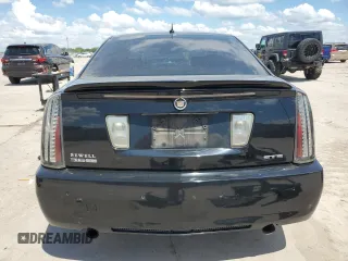 2008 Cadillac STS RWD z VIN 1G6DK67V980143995, wystawiony jako Copart lot #56365325 z przebiegiem 128 787 mil mil oraz Szkody całkowita. Historia ofert i sprzedaży dostępna na DreamBid. Obrazek 6.