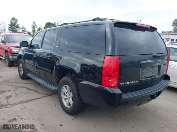 2013 GMC Yukon XL SLT with VIN 1GKS1KE00DR332987, listed as a IAAI auction lot 41512378 with 190,693 mi miles. Bid and sale history available at carsss.com. Image 14.