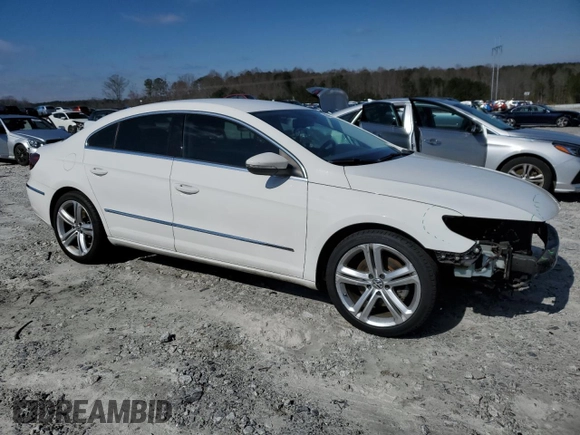 2013 Volkswagen CC Sport with VIN WVWBN7AN6DE539681, listed as a Copart auction lot 45477985 with 121,128 mi miles and Salvage Title. Bid and sale history available at DreamBid. Image 4.