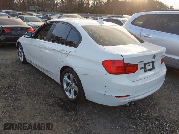 2014 BMW 3 Series 328i xDrive with VIN WBA3B5C52EF958635, listed as a IAAI auction lot 40916777 with 143,975 mi miles. Bid and sale history available at carsss.com. Image 3.