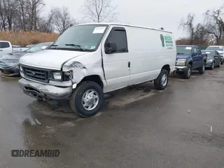 2005 Ford Econoline Cargo with VIN 1FTNE24W95HB25640, listed as a IAAI auction lot 41335337 with 183,045 mi miles. Bid and sale history available at carsss.com. Image 2.