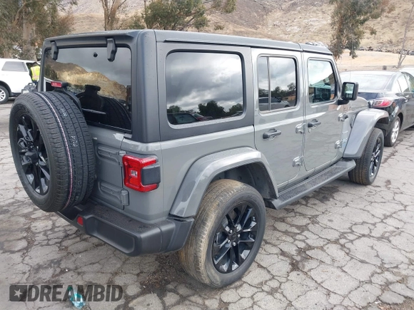 2021 Jeep Wrangler Unlimited Sahara with VIN 1C4JJXP64MW720263, listed as a IAAI auction lot 41514302 with 73,300 mi miles and . Bid and sale history available at DreamBid. Image 4.