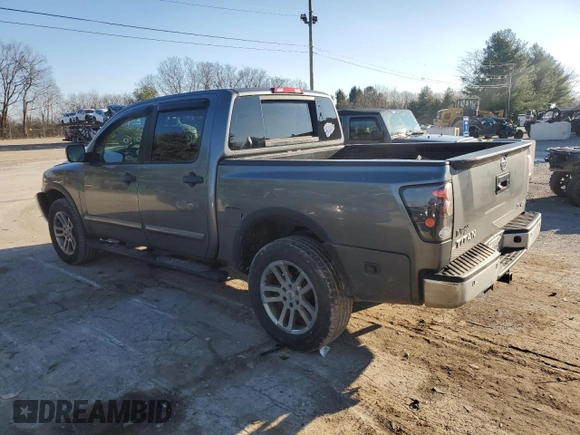 2015 Nissan Titan SV with VIN 1N6AA0EC5FN501124, listed as a Copart auction lot 87291164 with 195,448 mi miles and Salvage title. Bid and sale history available at DreamBid. Image 2.