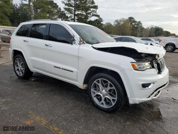 2021 Jeep Grand Cherokee Overland with VIN 1C4RJFCG1MC671472, listed as a Copart auction lot 86326714 with 103,760 mi miles and Salvage Title. Bid and sale history available at carsss.com. Image 4.