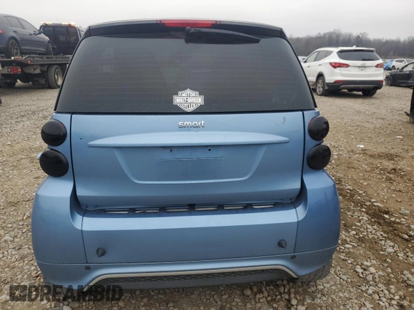 2015 Smart fortwo Passion z VIN WMEEJ3BA9FK791881, wystawiony jako Copart lot #43876595 z przebiegiem 56 699 mil mil oraz Szkody całkowita. Historia ofert i sprzedaży dostępna na DreamBid. Obrazek 6.
