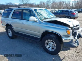 2000 Toyota 4Runner SR5 z VIN JT3HN86R5Y0283486, wystawiony jako IAAI lot #41601575 z przebiegiem 148 262 mil mil oraz . Historia ofert i sprzedaży dostępna na DreamBid. Obrazek 1.