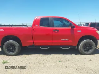 2008 Toyota Tundra z VIN 5TFBV54128X080074, wystawiony jako IAAI lot #42227681 z przebiegiem 176 042 mil mil oraz . Historia ofert i sprzedaży dostępna na DreamBid. Obrazek 13.