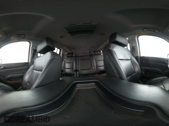 2019 Chevrolet Suburban LT with VIN 1GNSKHKCXKR405555, listed as a IAAI auction lot 42188860 with 143,435 mi miles and . Bid and sale history available at DreamBid. Image 18.