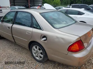 2000 Toyota Avalon XL z VIN 4T1BF28B2YU048155, wystawiony jako IAAI lot #42350570 z przebiegiem 254 043 mil mil oraz . Historia ofert i sprzedaży dostępna na DreamBid. Obrazek 6.