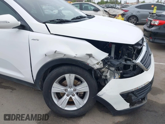 2013 Kia Sportage LX with VIN KNDPBCA21D7356092, listed as a IAAI auction lot 42111086 with 102,521 mi miles and . Bid and sale history available at carsss.com. Image 18.