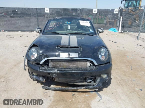 2012 MINI Roadster S with VIN WMWSY3C56CT144520, listed as a IAAI auction lot 41818205 with 86,836 mi miles and . Bid and sale history available at DreamBid. Image 12.