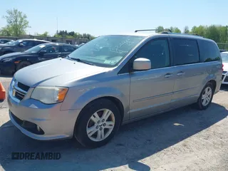2013 Dodge Grand Caravan Crew with VIN 2C4RDGDG1DR800538, listed as a IAAI auction lot 42211140 with 138,647 mi miles and . Bid and sale history available at DreamBid. Image 2.