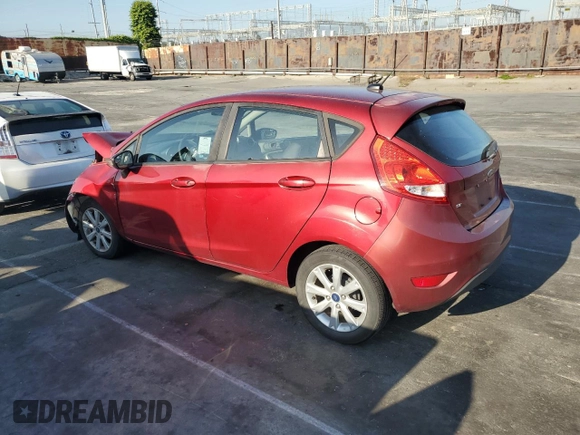 2013 Ford Fiesta SE with VIN 3FADP4EJ6DM144375, listed as a Copart auction lot 52124605 with 96,968 mi miles and Salvage Title. Bid and sale history available at carsss.com. Image 2.