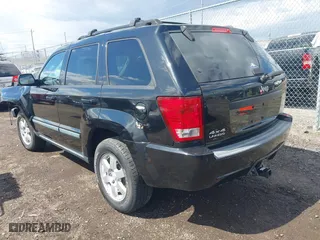 2009 Jeep Grand Cherokee Laredo with VIN 1J8GR48K99C550822, listed as a IAAI auction lot 41868508 with 179,436 mi miles. Bid and sale history available at carsss.com. Image 3.