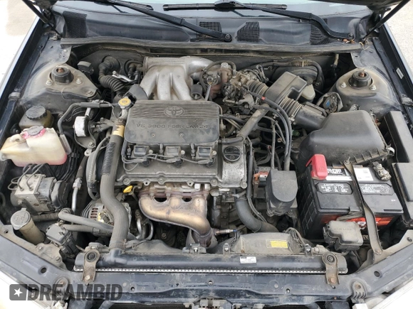 2000 Toyota Camry LE z VIN 4T1BF22K9YU949936, wystawiony jako Copart lot #54782815 z przebiegiem 239 139 mil mil oraz Szkoda całkowita • Salvage title. Historia ofert i sprzedaży dostępna na DreamBid. Obrazek 11.
