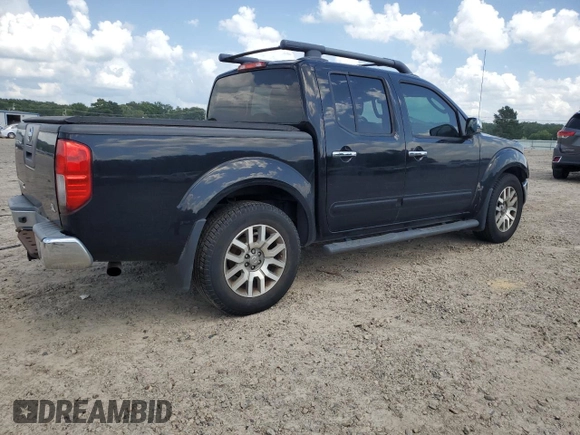 2011 Nissan Frontier SL with VIN 1N6AD0ERXBC440046, listed as a Copart auction lot 61645595 with 130,639 mi miles and Salvage title. Bid and sale history available at DreamBid. Image 3.