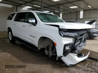 2023 Chevrolet Suburban Premier with VIN 1GNSKFKD8PR543891, listed as a Copart auction lot 53661735 with 34,857 mi miles and Salvage Title. Bid and sale history available at DreamBid. Image 4.