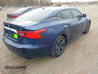 2016 Nissan Maxima Platinum z VIN 1N4AA6AP4GC414364, wystawiony jako IAAI lot #40738491 z przebiegiem 97 889 mil mil oraz . Historia ofert i sprzedaży dostępna na DreamBid. Obrazek 4.