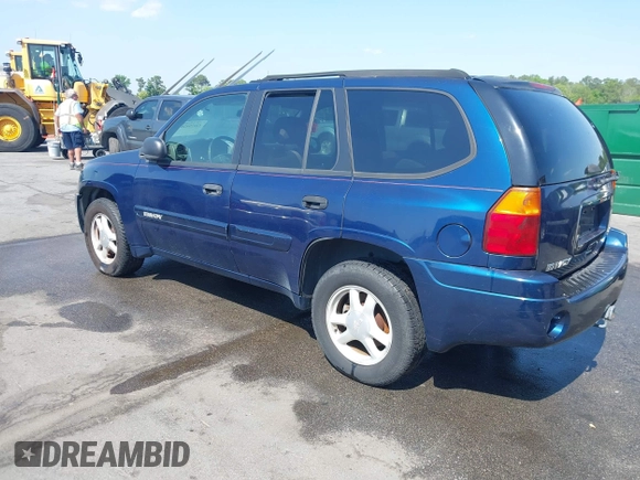 2004 GMC Envoy SLE with VIN 1GKDT13S242391968, listed as a IAAI auction lot 42079420 with 234,611 mi miles. Bid and sale history available at carsss.com. Image 3.