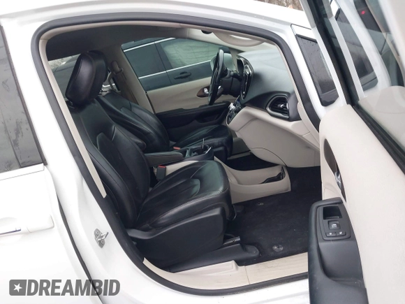 2017 Chrysler Pacifica Touring L with VIN 2C4RC1BG4HR583463, listed as a IAAI auction lot 41487599 with 180,459 mi miles and . Bid and sale history available at DreamBid. Image 5.