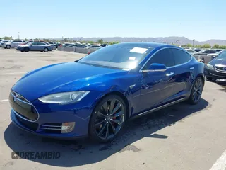 2016 Tesla Model S 70 kWh Battery with VIN 5YJSA1E10GF126433, listed as a IAAI auction lot 42169558 with 120,182 mi miles and . Bid and sale history available at carsss.com. Image 2.