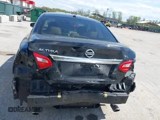 2016 Nissan Altima SR with VIN 1N4AL3AP0GC176277, listed as a IAAI auction lot 42022062 with 162,046 mi miles and . Bid and sale history available at carsss.com. Image 6.