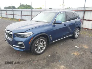 2020 BMW X5 xDrive40i z VIN 5UXCR6C08L9C37774, wystawiony jako IAAI lot #42202870 z przebiegiem 23 918 mil mil oraz . Historia ofert i sprzedaży dostępna na DreamBid. Obrazek 18.