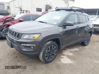 2019 Jeep Compass Trailhawk with VIN 3C4NJDDB1KT739938, listed as a IAAI auction lot 41411173 with 140,396 mi miles and . Bid and sale history available at carsss.com. Image 2.
